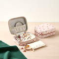 Coffret à bijoux en cuir zippé avec miroir, coloris blanc