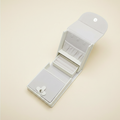 Boîte à bijoux de voyage pliable en cuir, coloris blanche