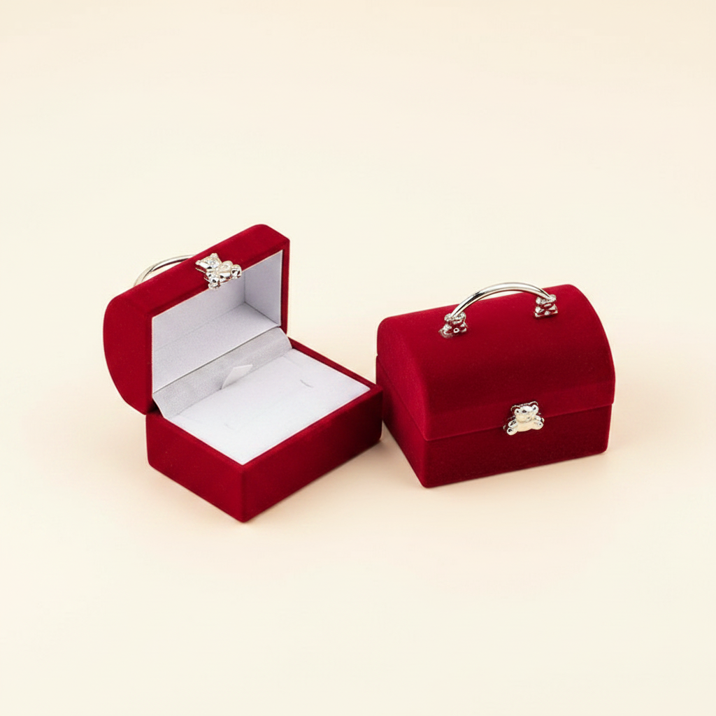 Coffret à bague en velours en forme de coffre, coloris rouge